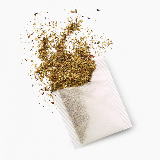 Sachet d'infusion des marmottes ouvert laissant voir les 7 plantes